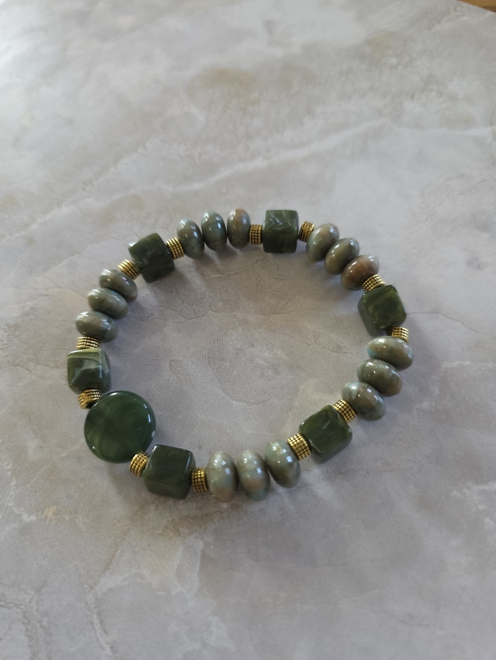 Green Beaded Stretch Bracelet with Gold Accents